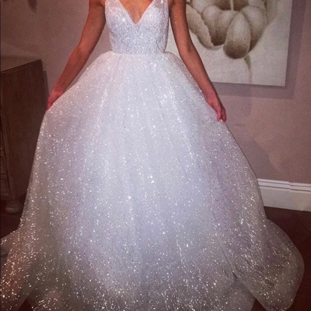 A-Line/Princess with a Tulle Sweep/Brush Train Sleeveless V-neck Dress